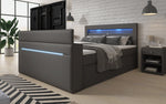 Lade das Bild in den Galerie-Viewer, Luxuriöses Boxspringbett Rinori: TV-Lift, USB, LED & Stauraum Deluxe