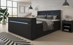 Lade das Bild in den Galerie-Viewer, Luxuriöses Boxspringbett Rinori: TV-Lift, USB, LED & Stauraum Deluxe